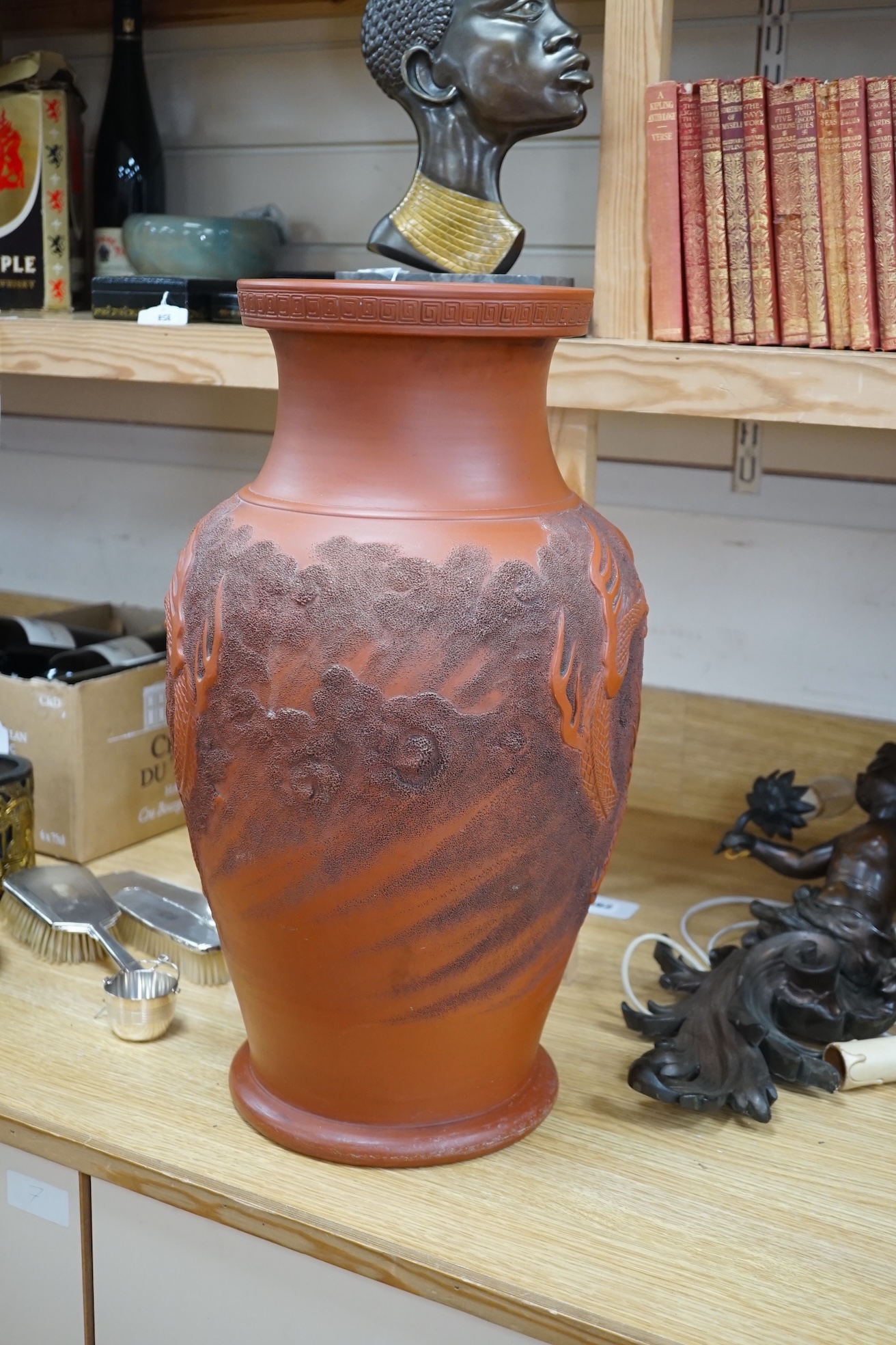 A large Japanese terracotta dragon decorated vase, 50cm high. Condition - hole drilled to base